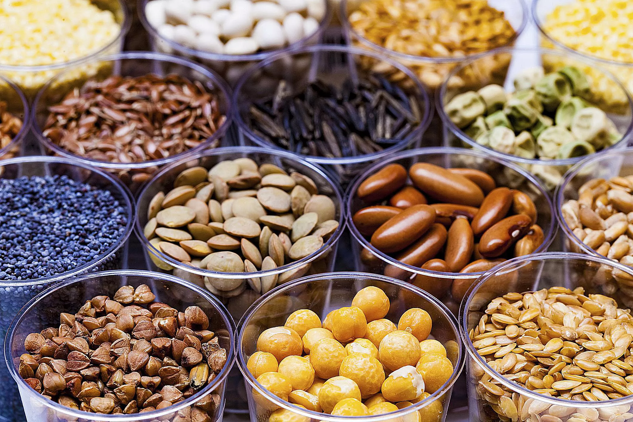 Variety of dried beans in open containers