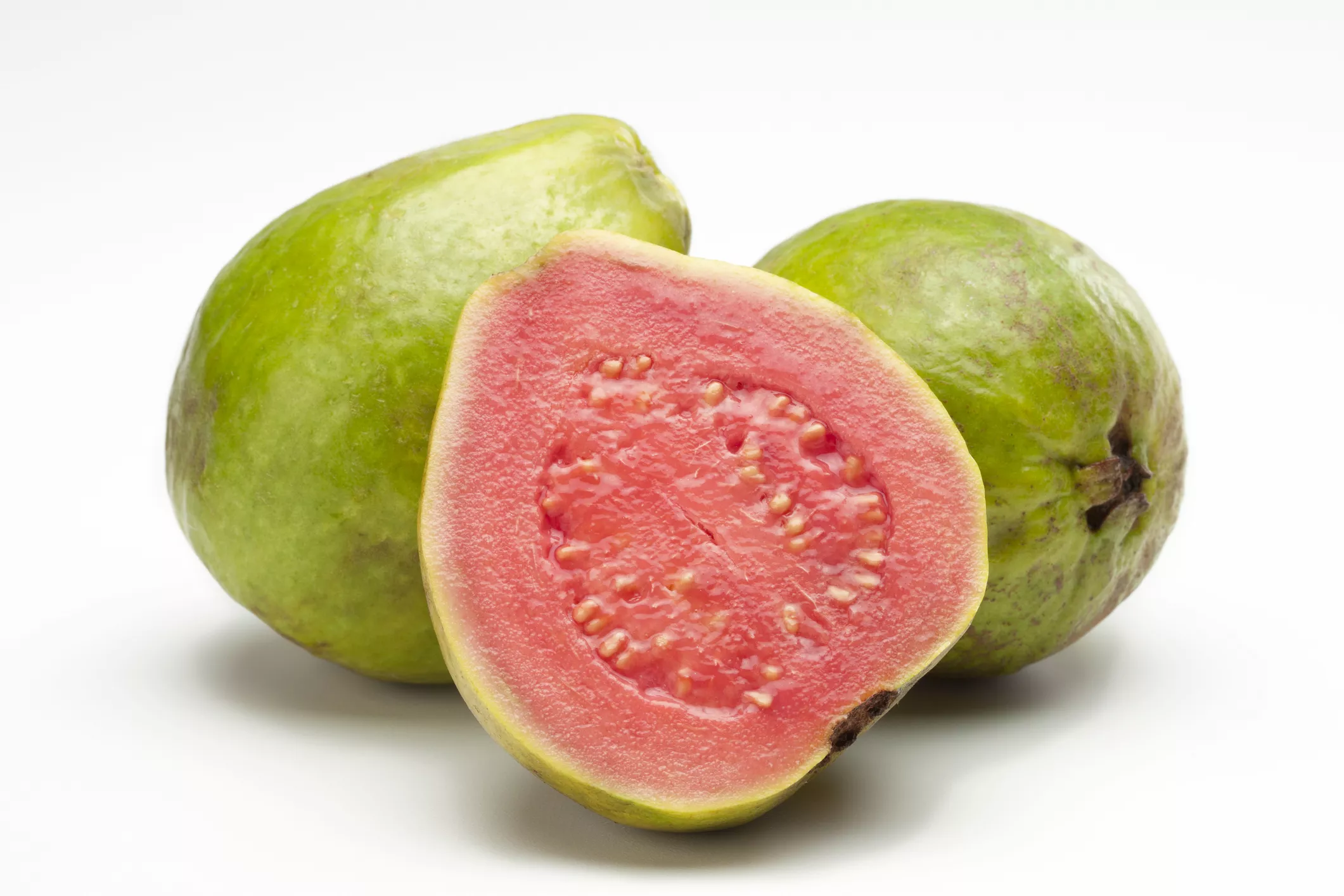 Guava fruit sliced in half.